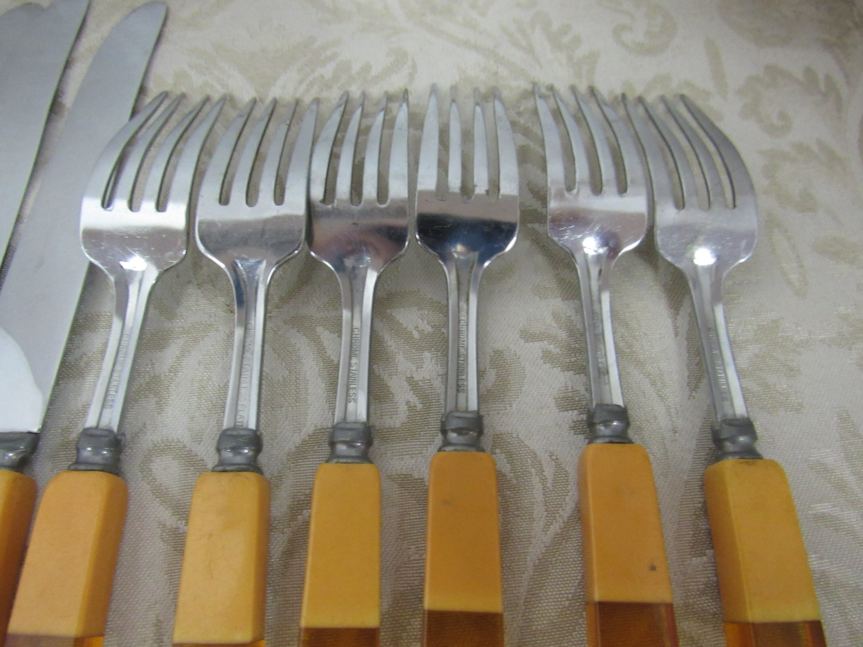 Butterscotch lucite flatware set