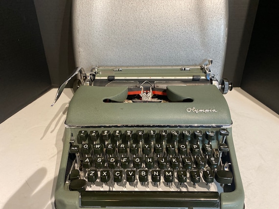 Olympia Deluxe Green and Chrome Portable Typewriter