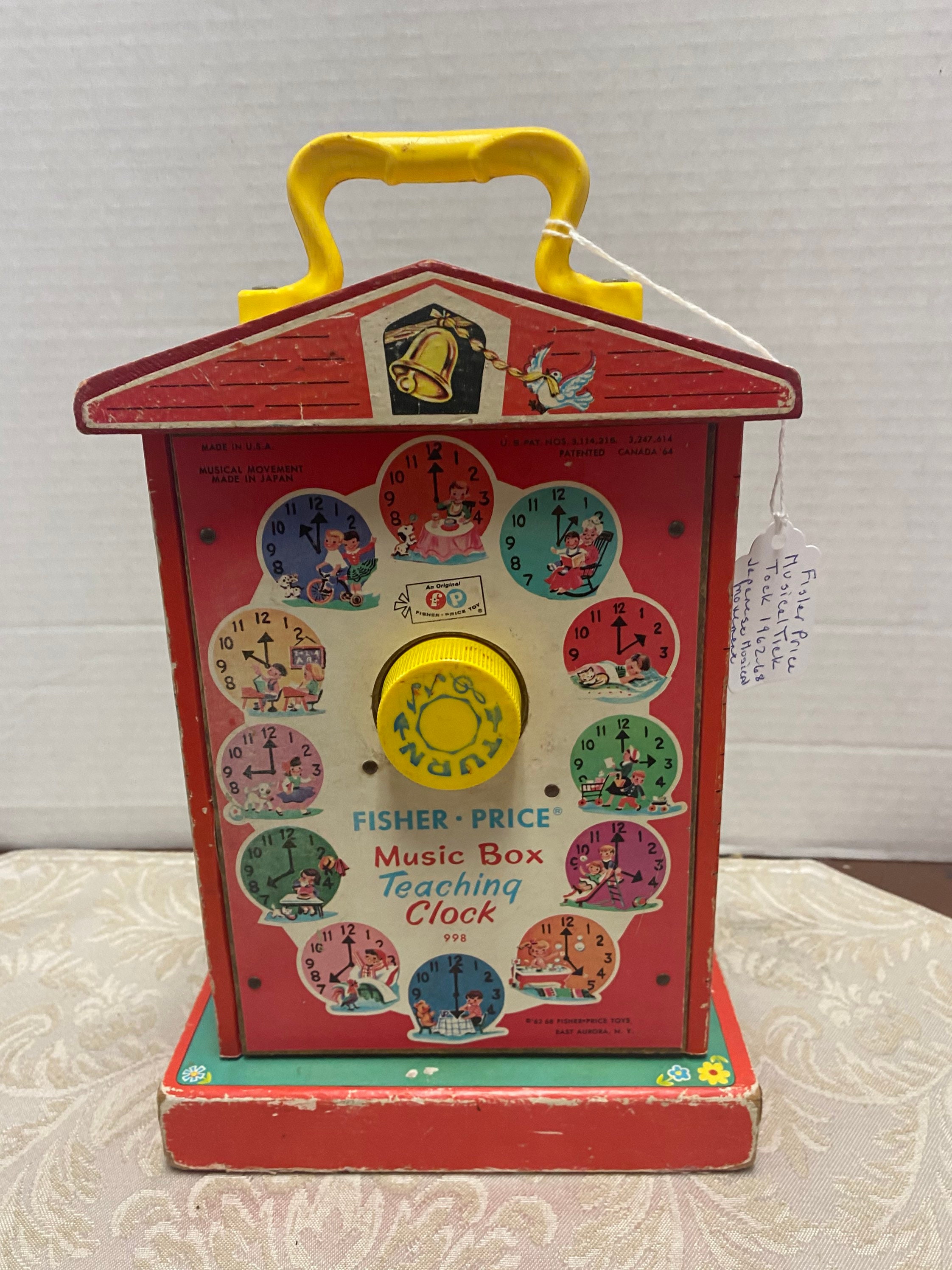Fisher price music box teaching clock 1962 sale