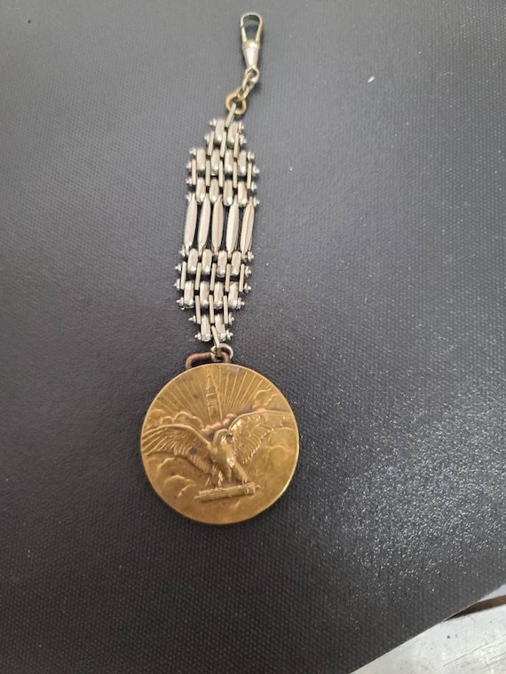 WWI award for selling war savings stamps Metropolitan  insurance turned into watch fob