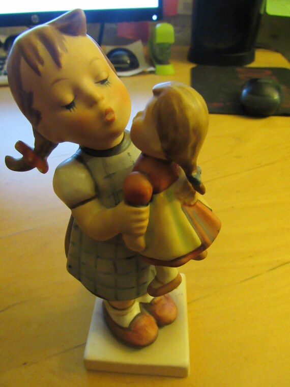 Hummel Goebel Girl kissing doll figurine
