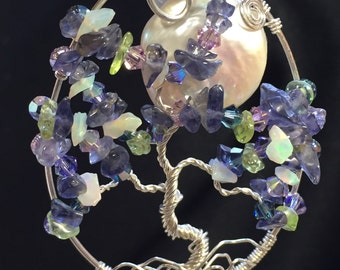 Argentium Sterling Silver large oval pendant. Iolite, Opal and Peridot chips with Swarovski crystal and a Freshwater Pearl moon.