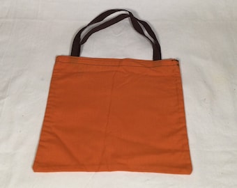 Coloured, reusable, recycled cotton fruit and vegetable shopping bags.