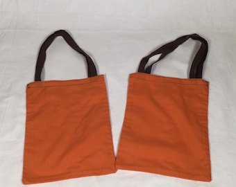 Coloured, reusable, recycled cotton fruit and vegetable shopping bags.