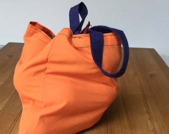 Coloured, reusable, recycled cotton fruit and vegetable shopping bags.