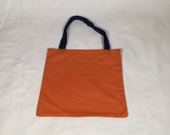 Coloured, reusable, recycled cotton fruit and vegetable shopping bags.