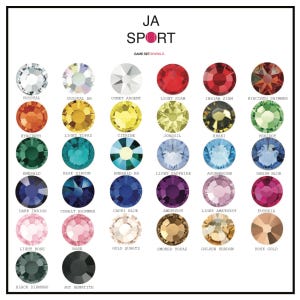 May include: A chart of 24 different colored rhinestones, labeled with their names. The chart is titled "JA SPORT GAME SET SPARKLE."