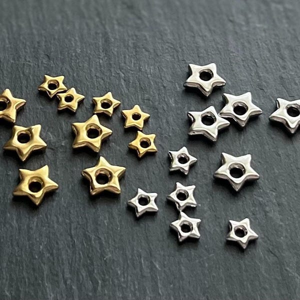 Dijes de estrellas de oro y plata, estrellas 3D abultadas de acero