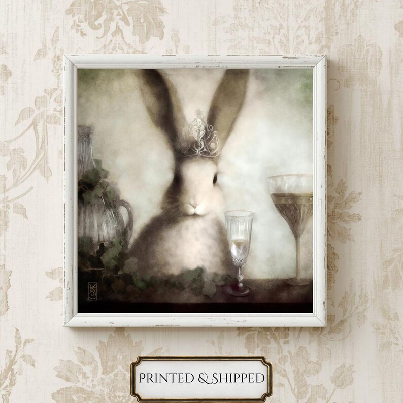 A framed painting depicting a white rabbit wearing a crown, surrounded by various objects such as a wine glass and a vase, set against a floral background.