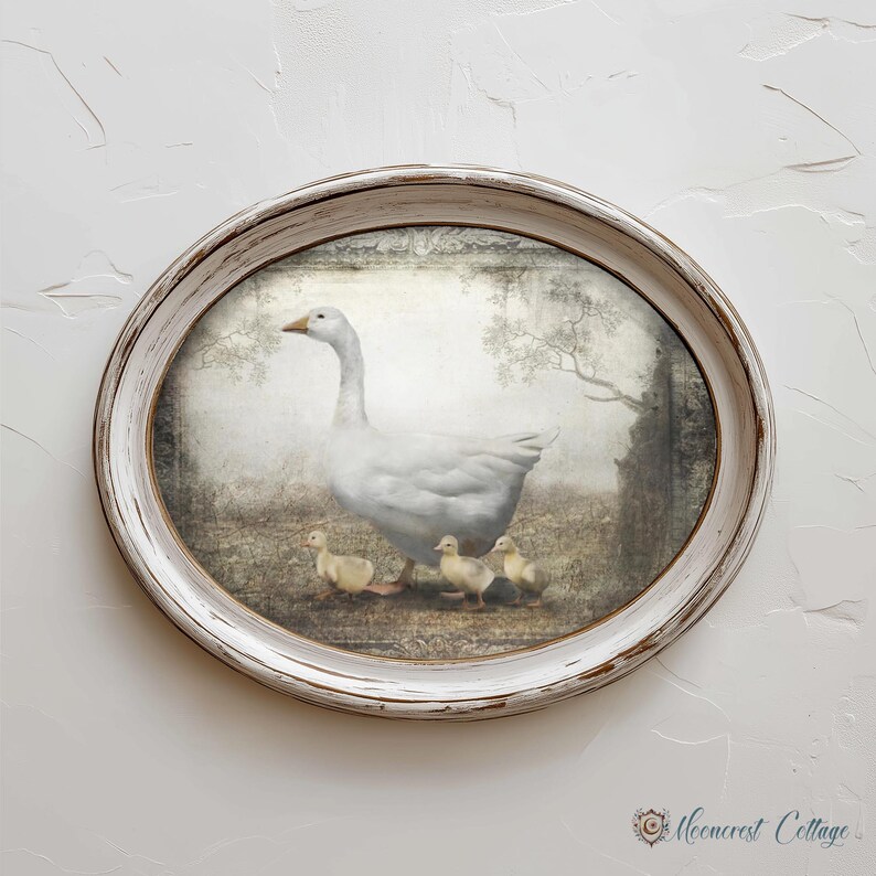 A white oval frame with a painting of a mother goose and her three ducklings on a grassy field.