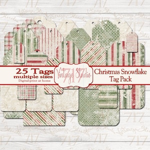 May include: A set of 25 printable Christmas snowflake gift tags in various sizes and designs. The tags feature a red and green color scheme with a distressed, vintage look. The text "25 Tags multiple sizes Digital-print at home Vintage Studio Christmas Snowflake Tag Pack" is displayed on a banner.