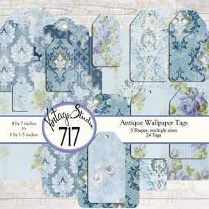 May include: A set of 24 antique wallpaper tags in blue and white with floral and damask patterns. The tags are in three shapes and various sizes, ranging from 1 by 1.5 inches to 4 by 7 inches.