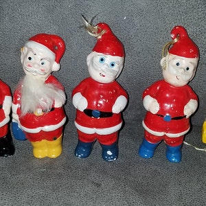 Vintage Set of 5 Santa Ornament?
