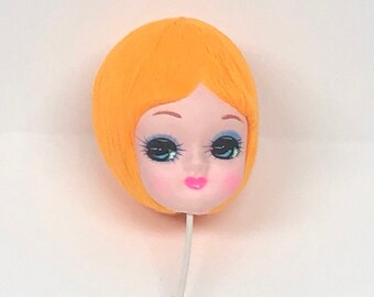 collectible dolls with big heads