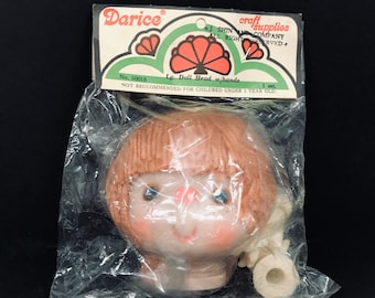Darice 4/" Yarn Hair Plastic Doll Head Orange