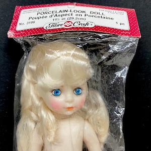 11.5” Porcelain-look Doll ©1989 Fibre Craft® Blonde Hair/blue Eyes