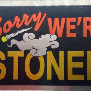 Sorry We&#39;re Stoned 2&quot;x3&quot; silver foil vinyl sticker