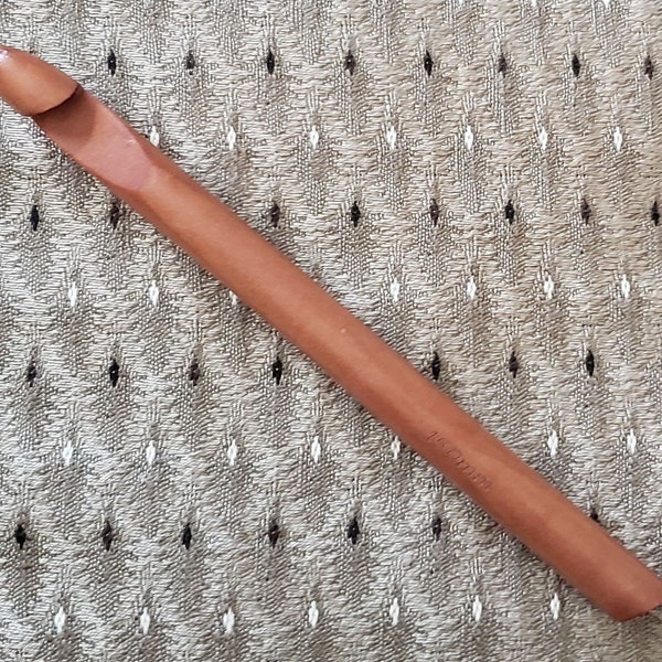 8" Wood Crochet Hook Size P-Q, used when crocheting thick material like making rag rugs.  New in package.