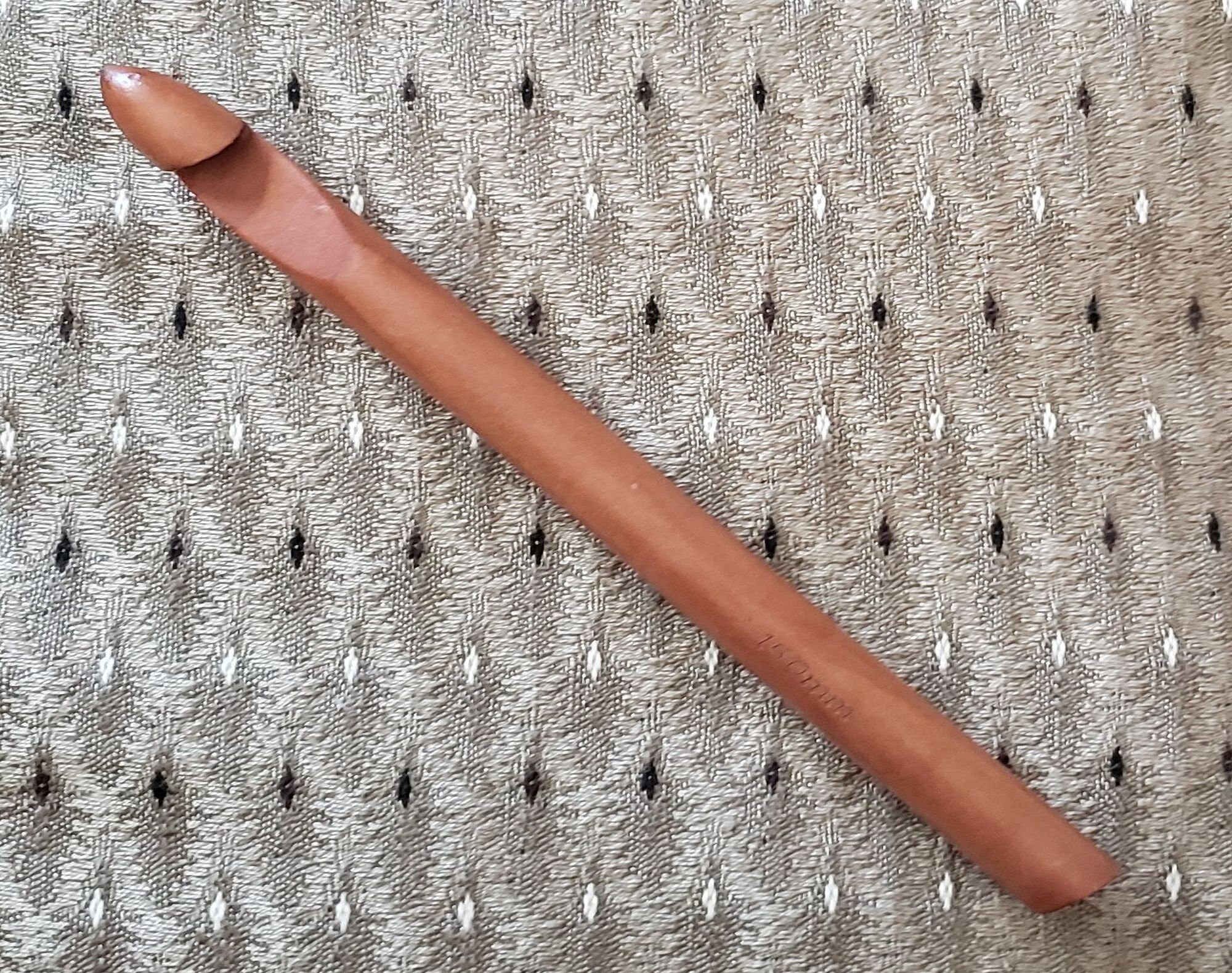 8" Wood Crochet Hook Size P-Q, used when crocheting thick material like making rag rugs.  New in package.