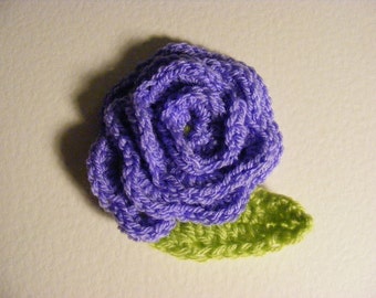 Lavender crocheted rose with lime green leaf brooch