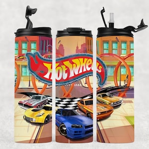 May include: Three insulated tumblers with a Hot Wheels design. The design features the Hot Wheels logo, race cars, and a city scene. Each tumbler has a black lid and a straw.