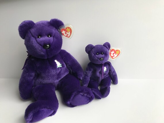 purple beanie baby with flower