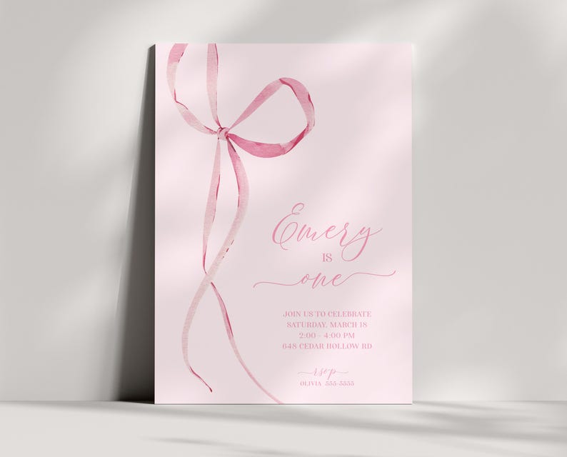 coquette aesthetic pink bow  birthday invitation.  editable template.  Pale pink background with a watercolor graphic of thin pink bow with long ribbons along left side of invite.  Party details in a modern script ballerina inspired font on right