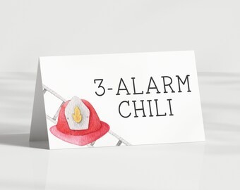 May include: A white card with the text "3-ALARM CHILI" in black font. A red and silver firefighter helmet with a yellow flame is on a white ladder.