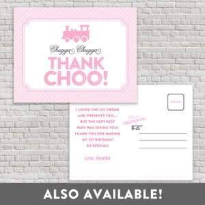May include: Pink and white thank you card with a pink train illustration and the text "Chugga Chugga Thank Choo!"  The card has a pink and white striped background. The text on the card reads: "I loved the ice cream and presents too... but the very best part was seeing you! Thank you for making my 1st birthday so special! Love, Amelia"
