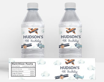 May include: Two water bottles with custom labels for a 4th birthday. The labels feature an orange and blue airplane design, the name "Hudson's", and the text "4th Birthday". Additional label shows nutrition facts and cloud illustrations.