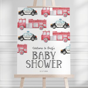 May include: A white baby shower sign with a red and black watercolor illustration of fire trucks and police cars. The text on the sign reads "Welcome to Emily's Baby Shower 12.17.20XX".