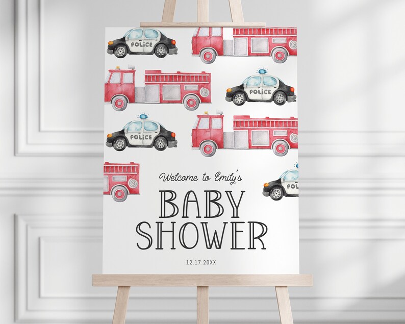 May include: A white baby shower sign with a red and black watercolor illustration of fire trucks and police cars. The text on the sign reads "Welcome to Emily's Baby Shower 12.17.20XX".