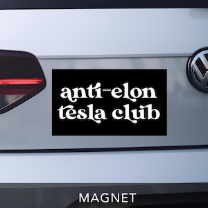 May include: Black and white car magnet with the text "anti-elon tesla club" in a white, stylized font.