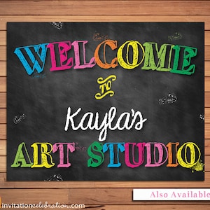 May include: A chalkboard sign with colourful text that reads "Welcome to Kayla's Art Studio".