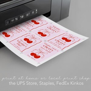 May include: Printable Valentine's Day gift tags featuring a pink background with red cherries and the text "You're the cherry on top!" and "Have a sweet Valentine's Day!"