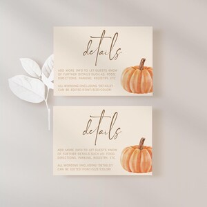 May include: Two printable cards with the word "details" in brown script and a watercolor illustration of an orange pumpkin. The text on the cards says "Add more info to let guests know of further details such as: food, directions, parking, registry, etc. All wording (including "details") can be edited (font/size/color)."