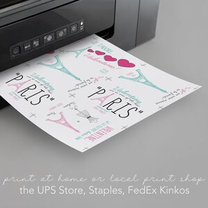 May include: A printer printing a sheet of paper with a Parisian theme design. The paper has a repeating pattern of the Eiffel Tower, hearts, and the text "Valentine in Paris". The text below the printer reads "print at home or local print shop the UPS Store, Staples, FedEx Kinkos".