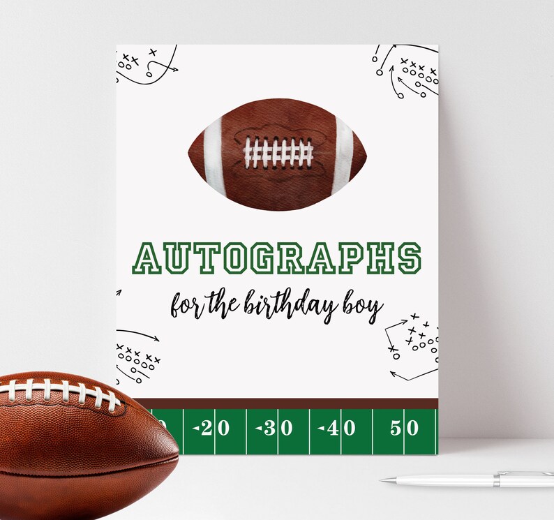 May include: A white card with a brown football illustration and the text "AUTOGRAPHS for the birthday boy". The card has a green football field design at the bottom with yard markers from -20 to 50.