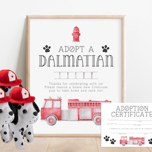 May include: Adopt a Dalmatian party sign with a red fire truck and fire hydrant illustration. The sign says "Adopt a Dalmatian" and includes the text "Thanks for celebrating with us! Please rescue a brave new firehouse pup to take home and care for!"  The sign is next to a stack of Dalmatian puppy plush toys and an adoption certificate.