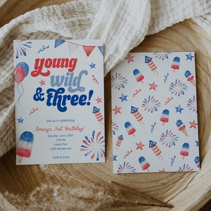 May include: Two invitation cards with a patriotic theme. One card reads "Young Wild & Three!" with details for a birthday party. The other card features a pattern of fireworks, popsicles, and stars in red, white, and blue.