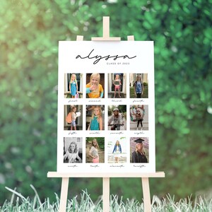 May include: A white poster board with a black handwritten name "Alyssa" and "Class of 2023" printed below. The poster board is divided into a grid of 12 squares, each containing a photo of a girl from different ages. Each square has the grade number printed below the photo.