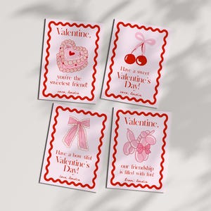 May include: Four Valentine's Day cards with red scalloped borders and illustrations. The cards feature a heart-shaped cake, cherries, a bow, and a balloon animal. Each card has a Valentine's message and the name "Amelia".