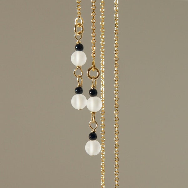 Tiny black onyx and white frosted white rock crystal quartz with 18K gold on 925 sterling silver threader earrings