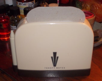 vintage bakelite plastic toaster note dispenser