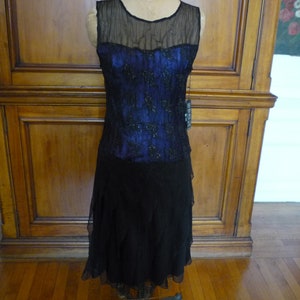 komarov a line dress Komarov Lace Sleeve Watercolor Dress, Turquoise – Evie Lou main image 0