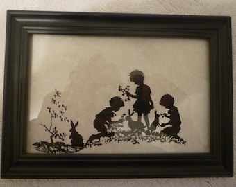 SILHOUETTES CHILDREN PLAYING Wall Or Stand Vintage Style Framed Silhouette Print Depicting Children At Play. Children Playing with Bunnies