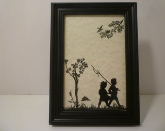 SILHOUETTES of CHILDREN PLAYING. Wall or Stand. Vintage style Framed Silhouette Print Depicting Children At Play. Children Going Fishing.