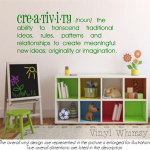 May include: A white bookshelf with six compartments, each painted in a different color. The top shelf has a green, yellow, and orange compartment. The middle shelf has a green, blue, and red compartment. The bottom shelf has a green, yellow, and orange compartment. The bookshelf is decorated with a vinyl decal that reads "creativity (noun) the ability to transcend traditional ideas, rules, patterns and relationships to create meaningful new ideas; originality or imagination." The decal is in green text. The bookshelf is also decorated with a toy phone, a toy dog, and a toy truck. The bookshelf is sitting on a white rug. The text "Vinyl Whimsy" is at the bottom of the image.