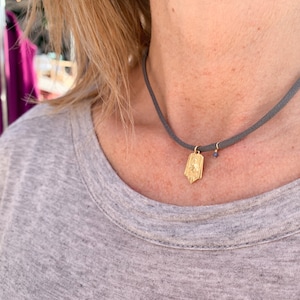 18k gold Scapular necklace/stretch cord/semiprecious stone.
