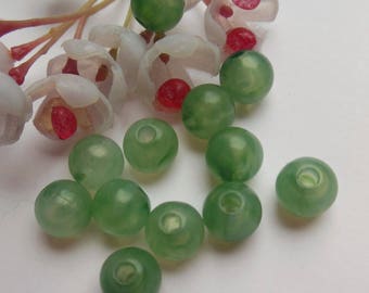 set of 12 green plastic round beads
